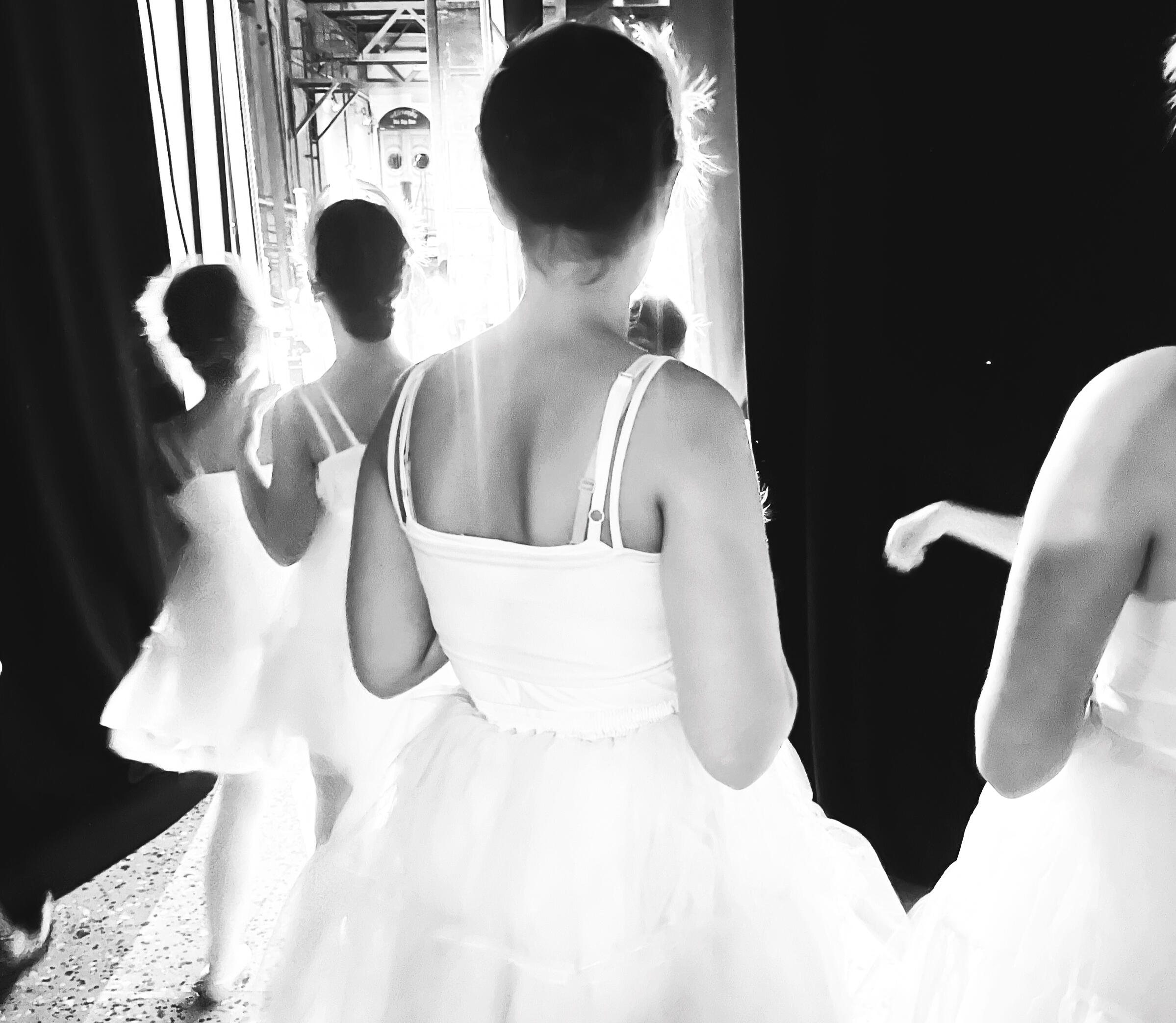 Brave Performer black and white photo of ballet dancers waiting in the wings to go on stage
